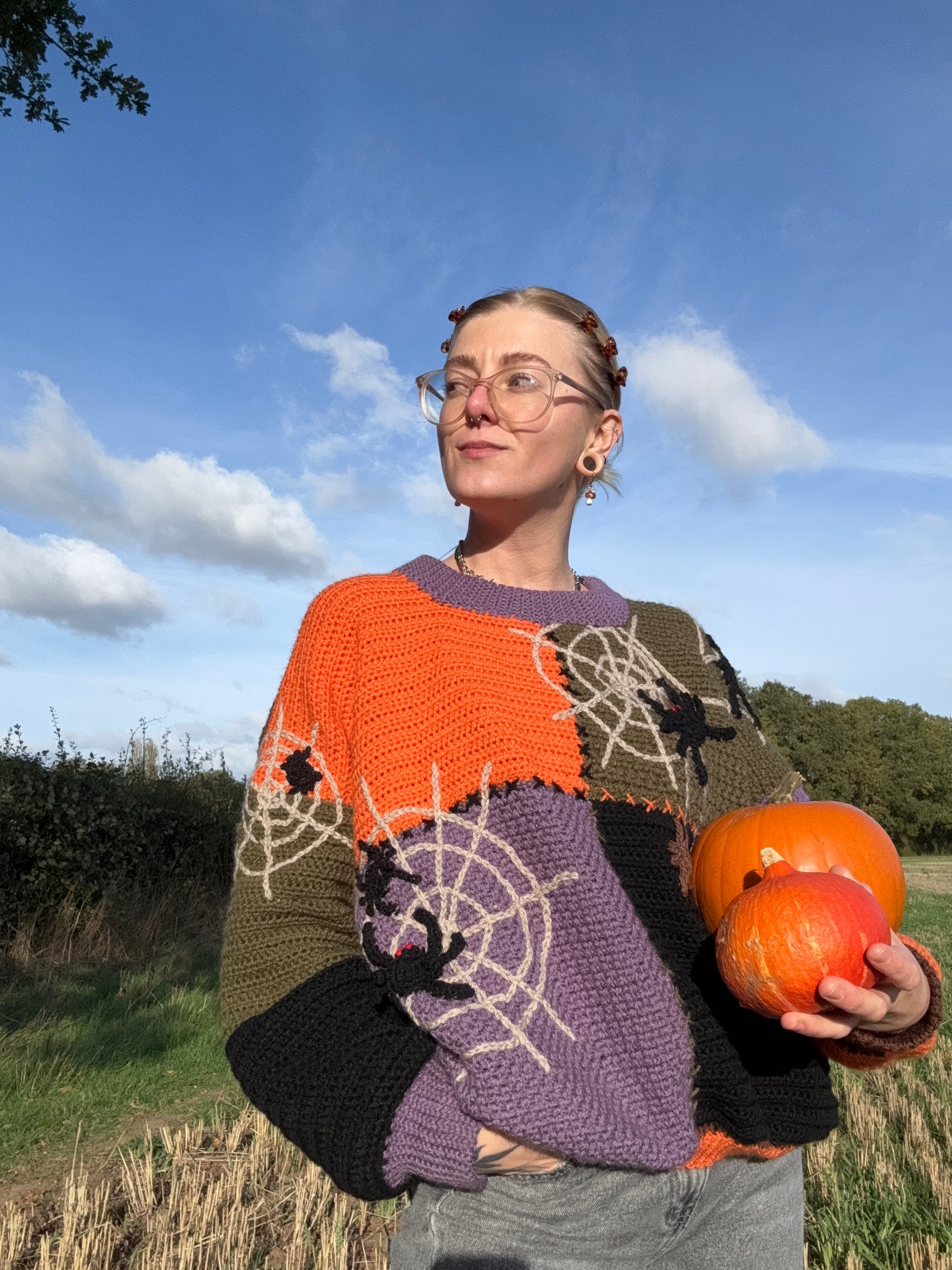 Pumpkin patch sweater crochet pattern. Designed with Halloween details. Cozy fall outfit made in orange, brown, purple and black colors. Customizable in size and color crochet pattern. Instant PDF download.
