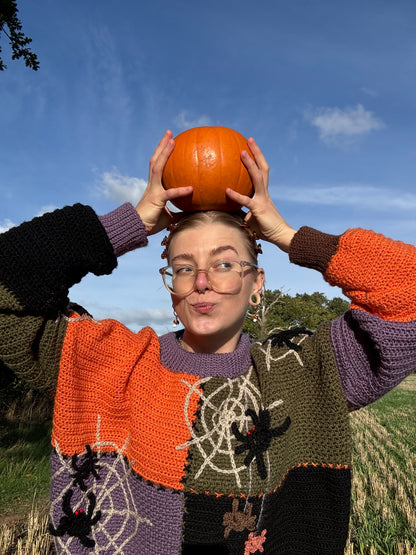 Beginners Friendly oversized sweater with autumn details crochet pattern. Made-to-measure, customizable in size and color. Cozy fit for autumn walks and pumpkin patch days. Sweater in green, brown, orange, purple colors.