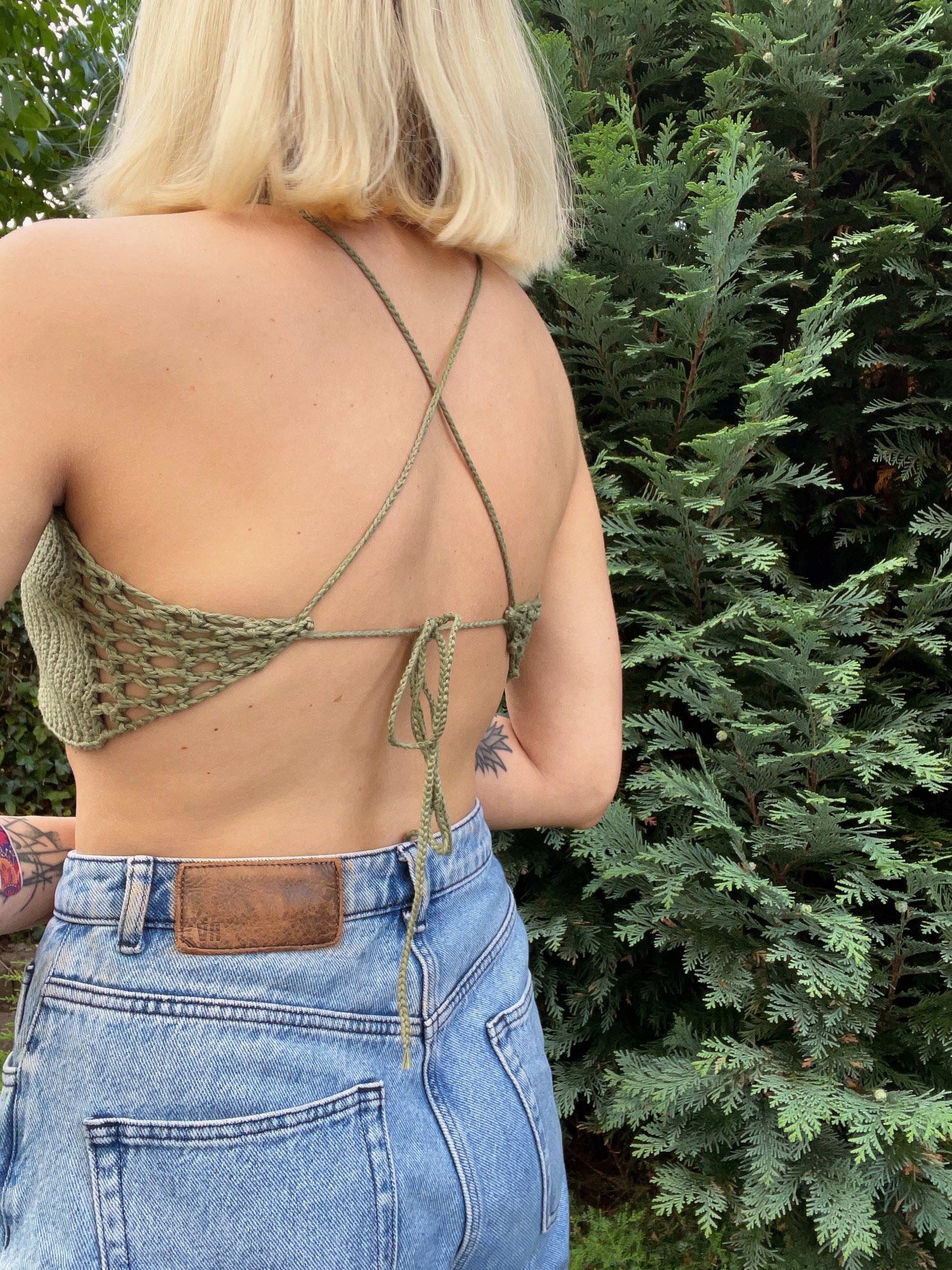 Women's open back beach top – lightweight summer blouse for beachwear, breathable backless cover-up for vacation or resort style, in Moss Green color from the back.